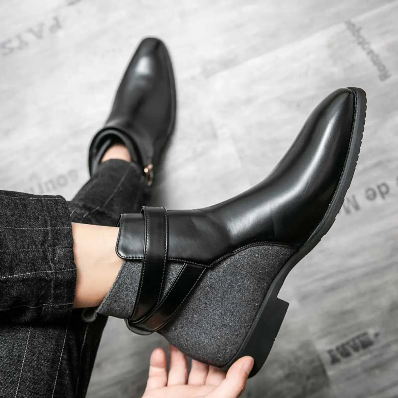 Black join accents buckle slip on shoe boot
