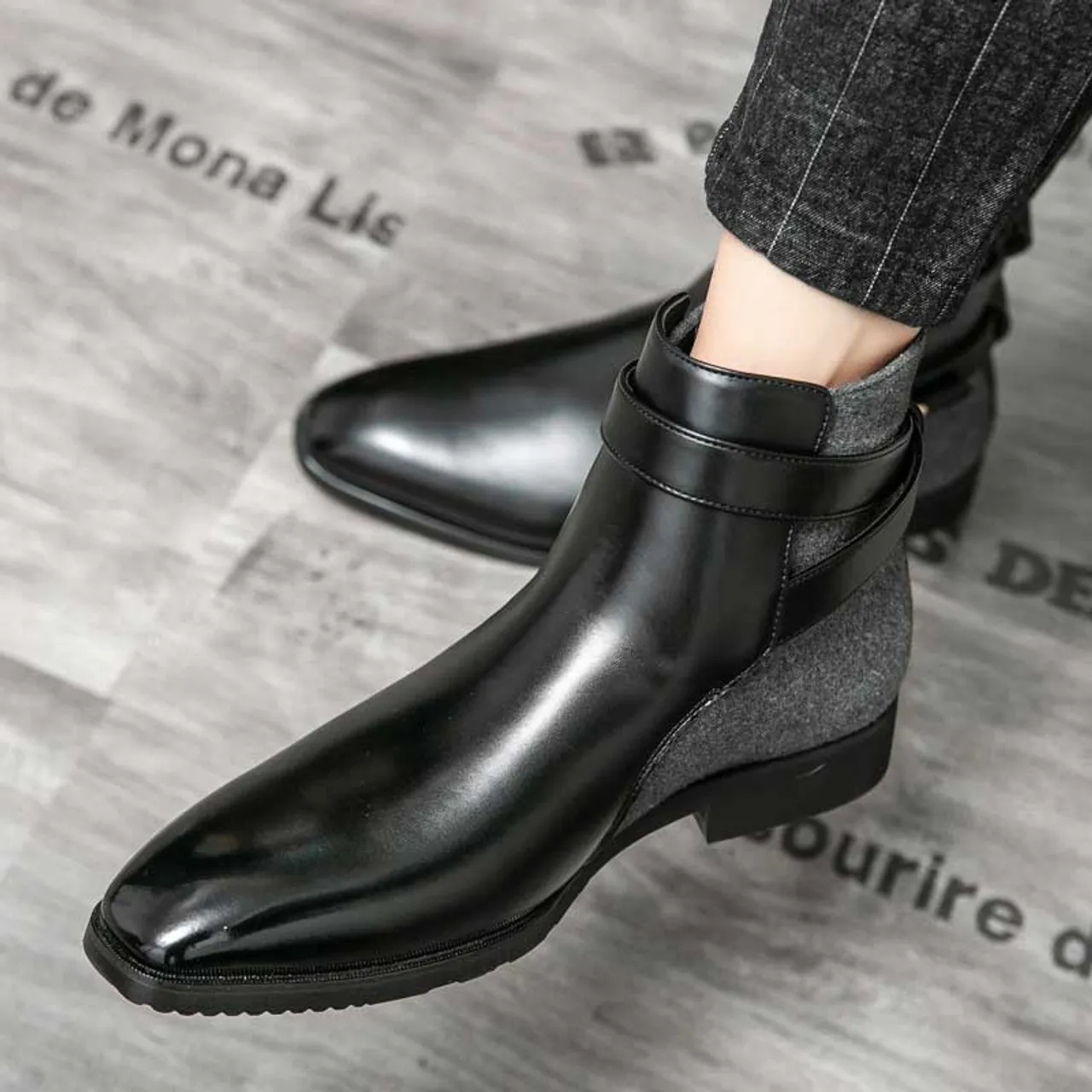 Black join accents buckle slip on shoe boot
