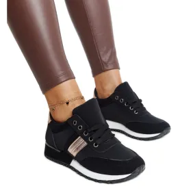 Black sneakers on a Nihad rubber platform