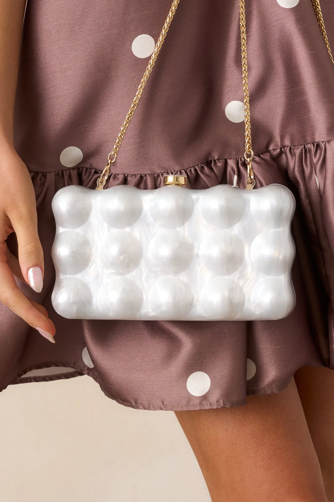 Eclipse’s Whisper Ivory Pearlescent Clutch
