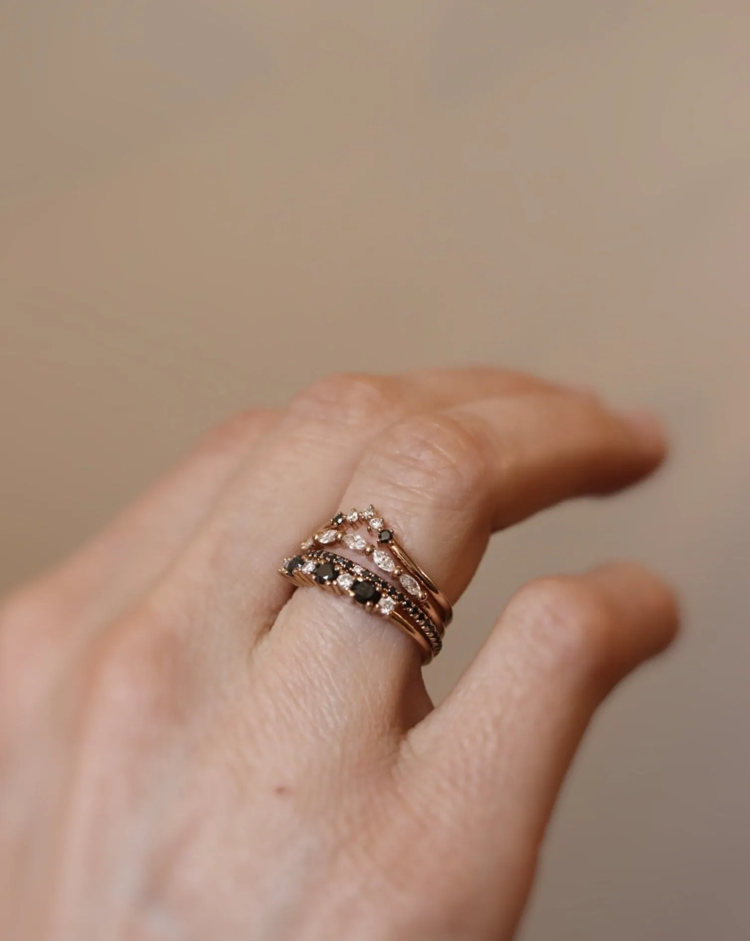 Five Diamond Triangle Ring with Black and White Diamonds