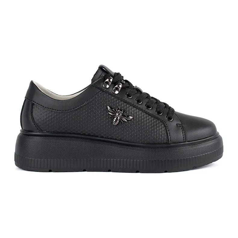 Leather black sneakers on the platform white
