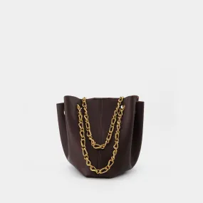 Nanushka  The Gather Bucket Bag in Brown Vegan Leather