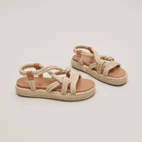 Sandals with cross-over straps in beige rope