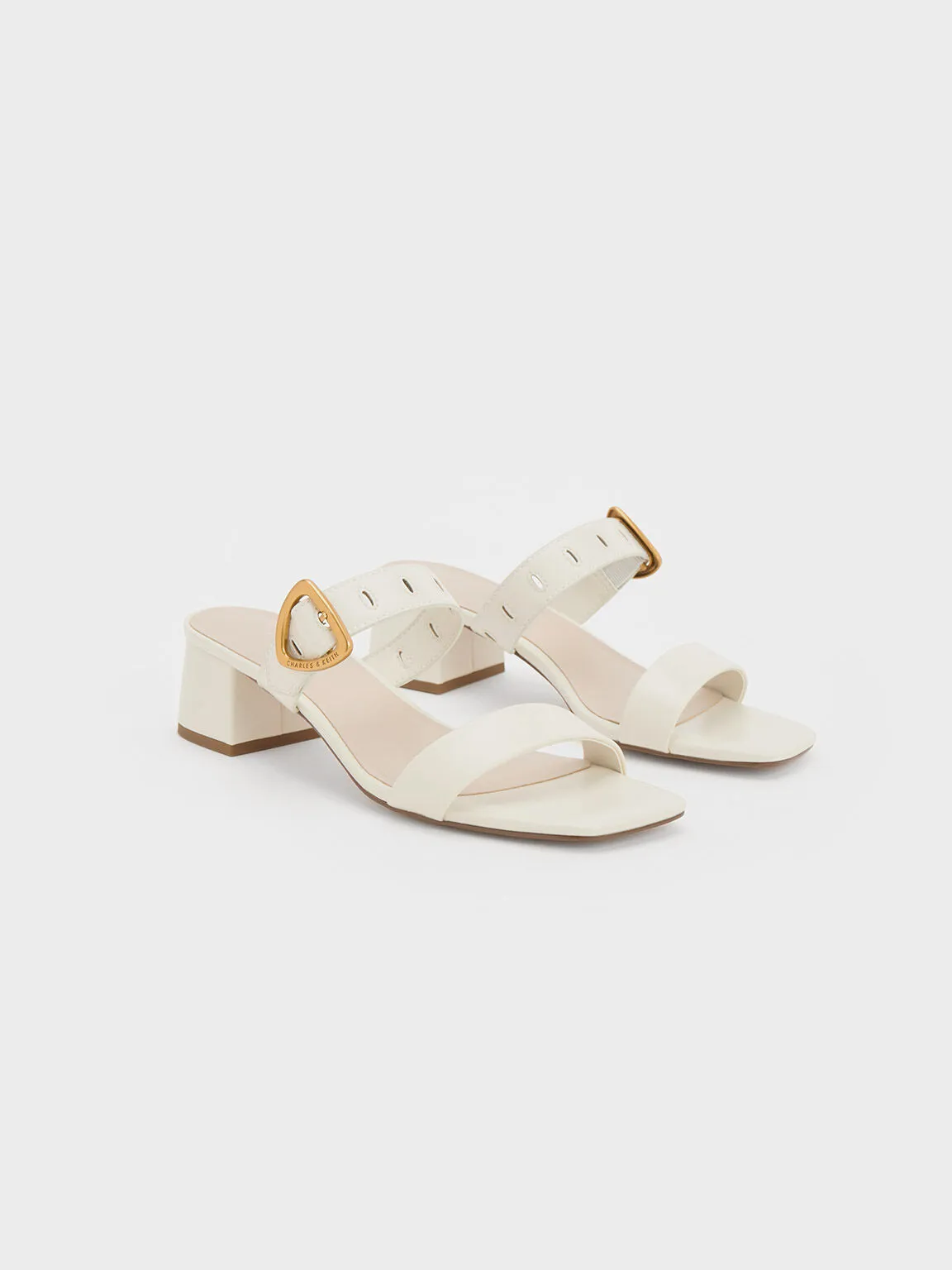 Sepphe Metallic Buckle Heeled Mules - Chalk