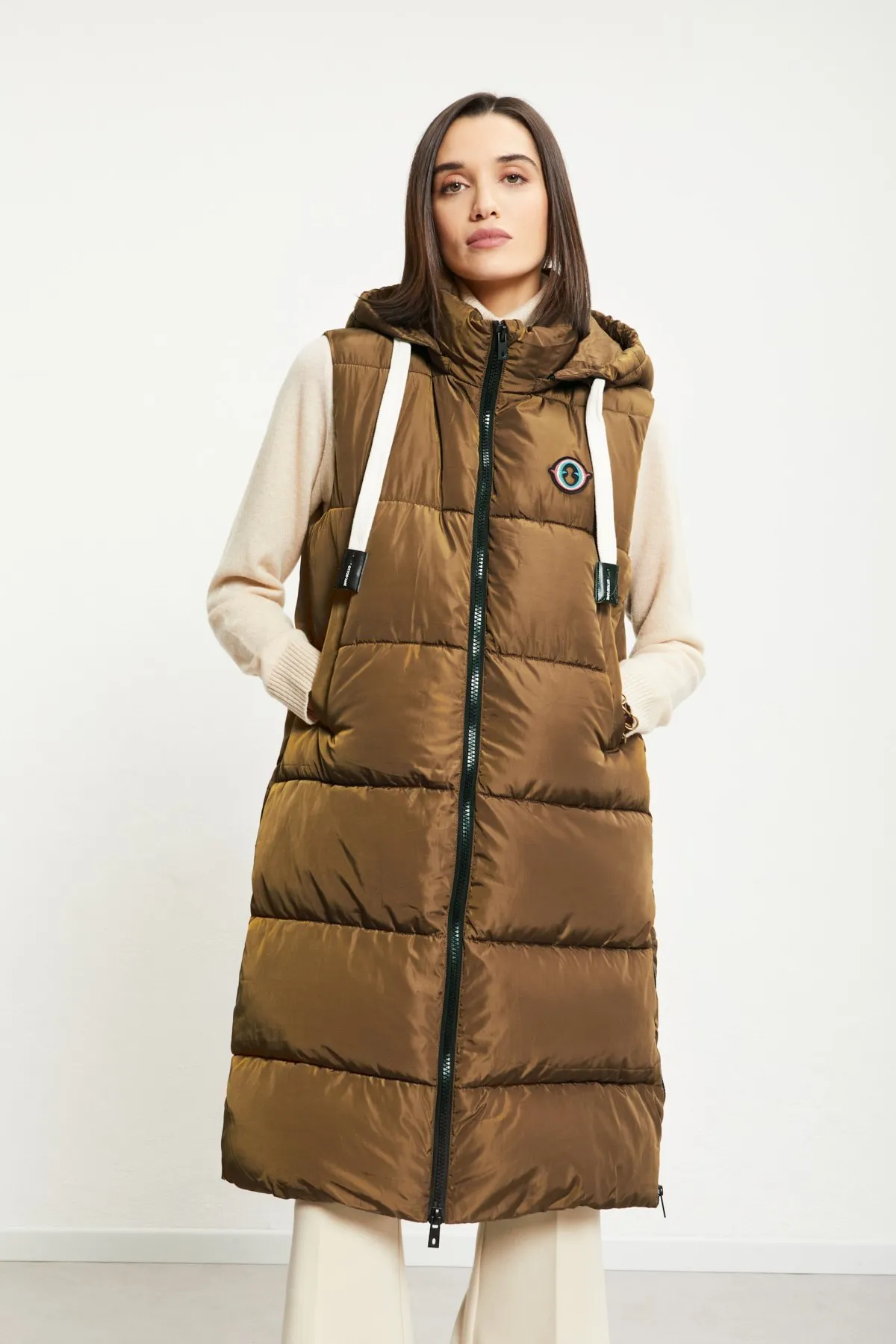 Sleeveless puffer midi jacket