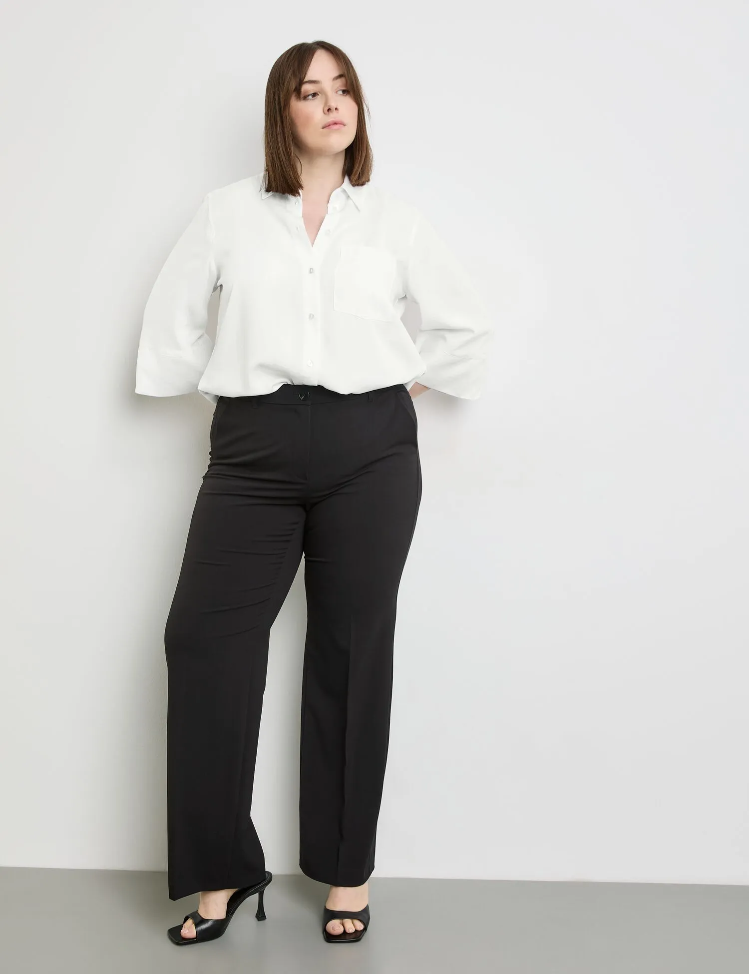 Smart pressed pleat trousers with a wide leg, Carlotta