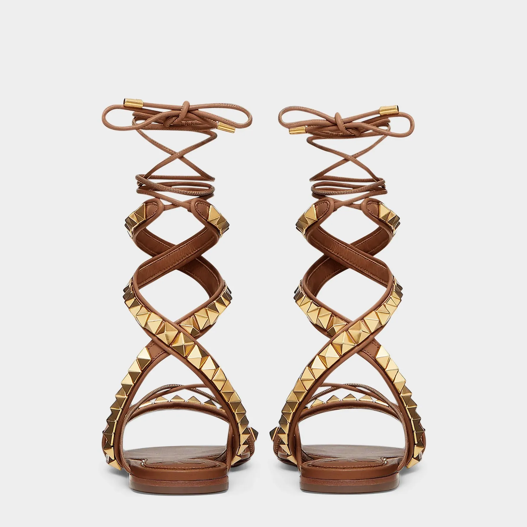 Valentino Garavani  Rockstud No Limit Sandals in Brown Leather